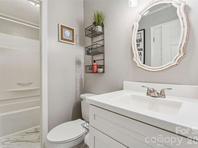 611 Woodland Drive, Rockwell, NC 28138.  MLS# CAR4418964, YatesRealty ID 49808. Second half bath