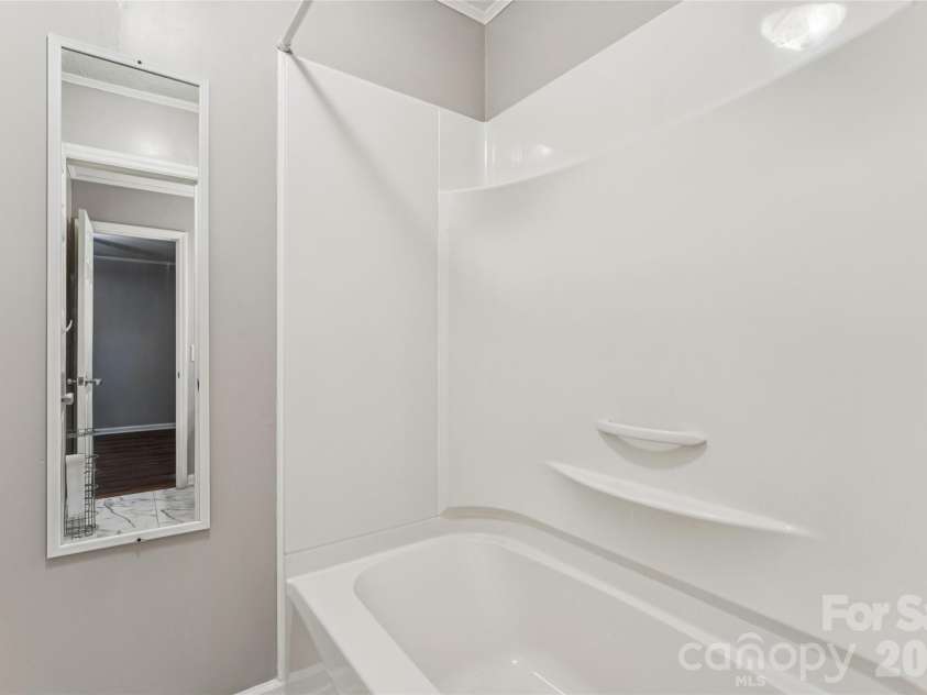 611 Woodland Drive, Rockwell, NC 28138.  MLS# CAR4418964, YatesRealty ID 49808. Shower in between two half baths