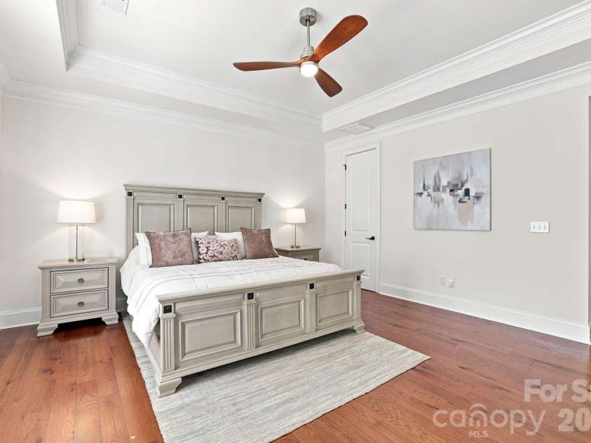 6831 Louisburg Square Lane, Charlotte, NC 28210.  MLS# CAR4417877, YatesRealty ID 49817. First floor primary bedroom