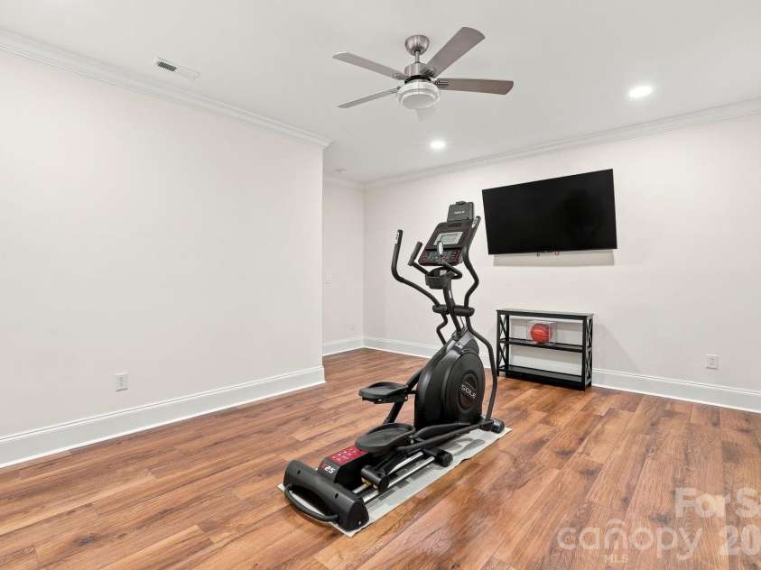 6831 Louisburg Square Lane, Charlotte, NC 28210.  MLS# CAR4417877, YatesRealty ID 49817. Large room for exercise or extra storage