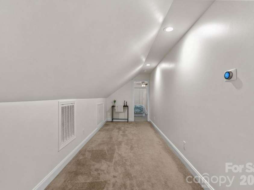 10429 Starwood Drive, Charlotte, NC 28215.  MLS# CAR4412020, YatesRealty ID 49827. Additional upstairs loft/flex space going towards a guest bedroom