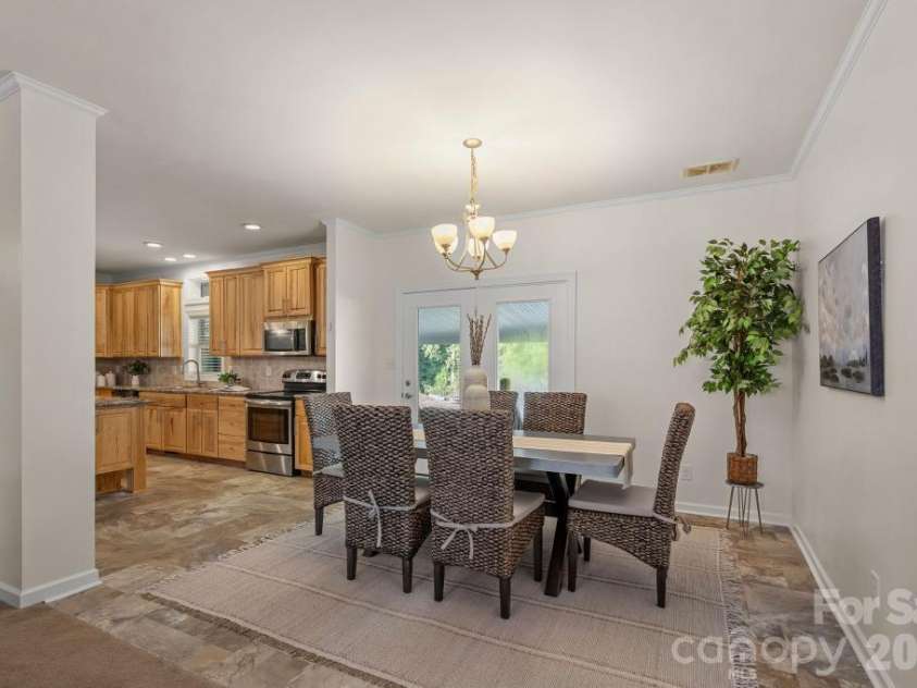 10429 Starwood Drive, Charlotte, NC 28215.  MLS# CAR4412020, YatesRealty ID 49827. Open dining room