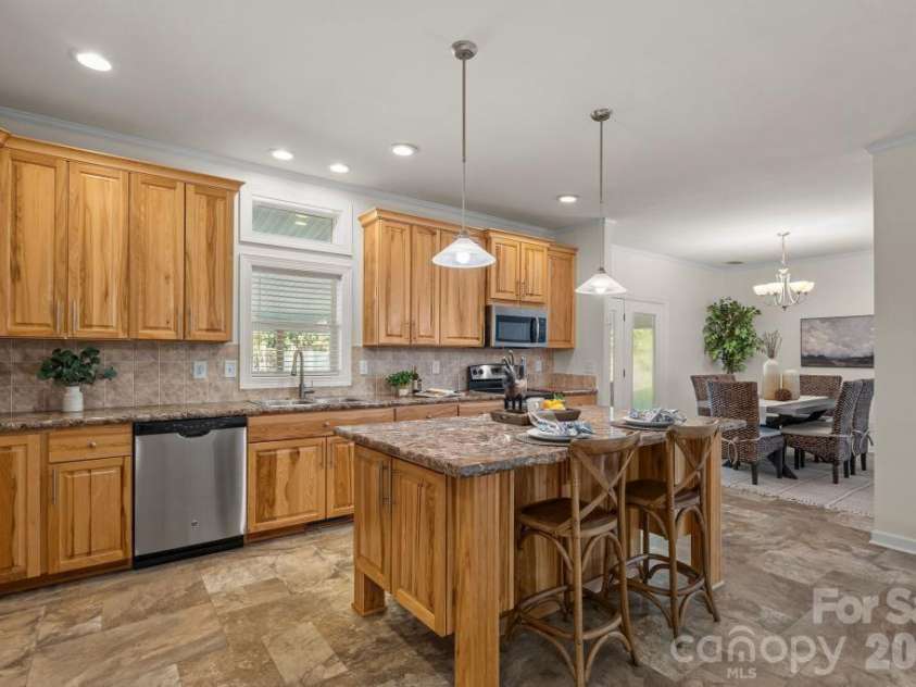 10429 Starwood Drive, Charlotte, NC 28215.  MLS# CAR4412020, YatesRealty ID 49827. Open Kitchen looking towards the dining room
