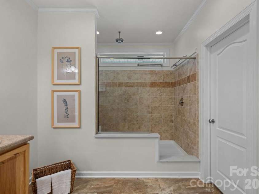 10429 Starwood Drive, Charlotte, NC 28215.  MLS# CAR4412020, YatesRealty ID 49827. Primary bathroom on main level