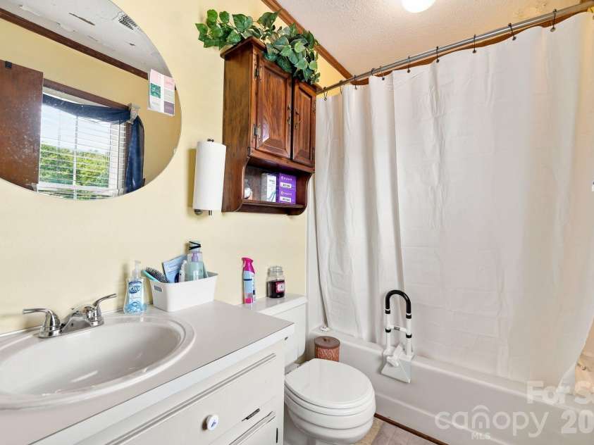 2325 Winterfield Drive, Gastonia, NC 28056.  MLS# CAR4408446, YatesRealty ID 49833. Guest bathroom