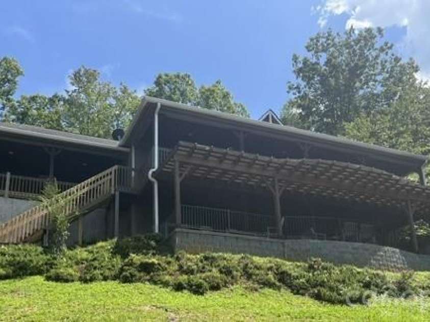 1237 South Cove Road, Mill Spring, NC 28756.  MLS# CAR4421708, YatesRealty ID 49838. Back of Home