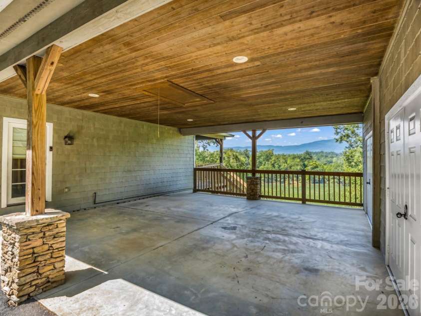 1237 South Cove Road, Mill Spring, NC 28756.  MLS# CAR4421708, YatesRealty ID 49838. Covered Parking or Entertainment area  with Extra Storage