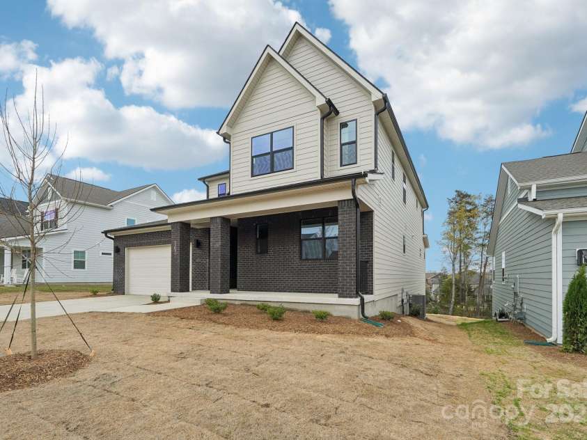 163 Windy Dell Drive, Tega Cay, SC 29708.  MLS# CAR4239219, YatesRealty ID 4984. Exterior of Home