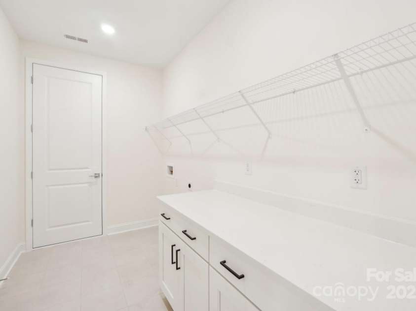 163 Windy Dell Drive, Tega Cay, SC 29708.  MLS# CAR4239219, YatesRealty ID 4984. Laundry