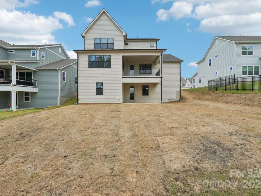 163 Windy Dell Drive, Tega Cay, SC 29708.  MLS# CAR4239219, YatesRealty ID 4984. Rear of Home