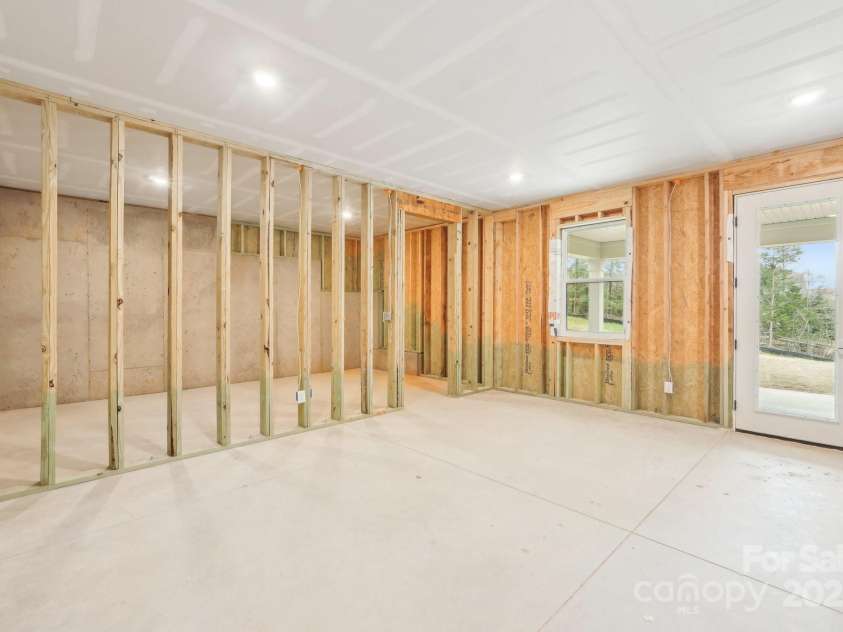 163 Windy Dell Drive, Tega Cay, SC 29708.  MLS# CAR4239219, YatesRealty ID 4984. Unfinished Basement