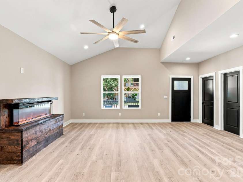 156 Edwards Avenue, Swannanoa, NC 28778.  MLS# CAR4422334, YatesRealty ID 49847. Natural light enhanced with vaulted ceiling