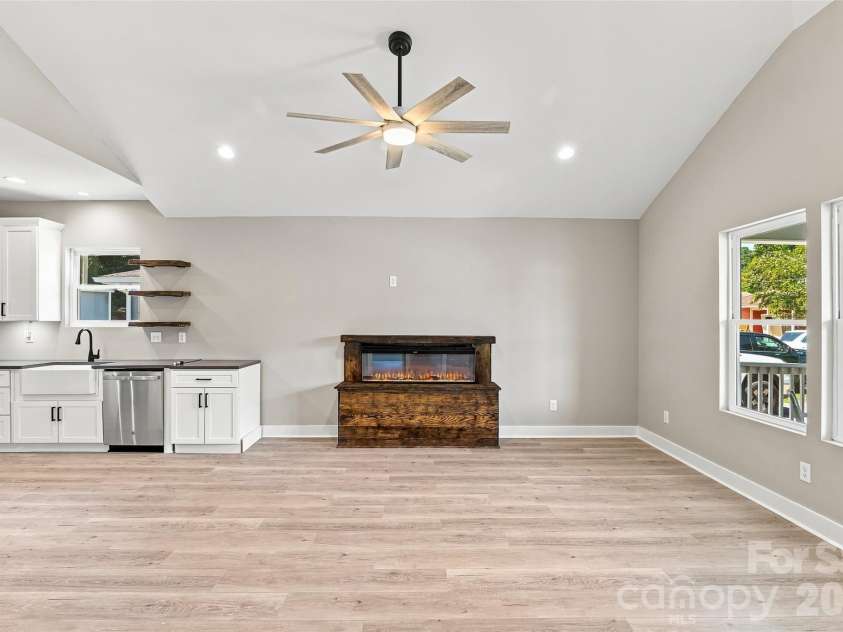 156 Edwards Avenue, Swannanoa, NC 28778.  MLS# CAR4422334, YatesRealty ID 49847. Natural light enhanced with vaulted ceiling in kitchen and living space