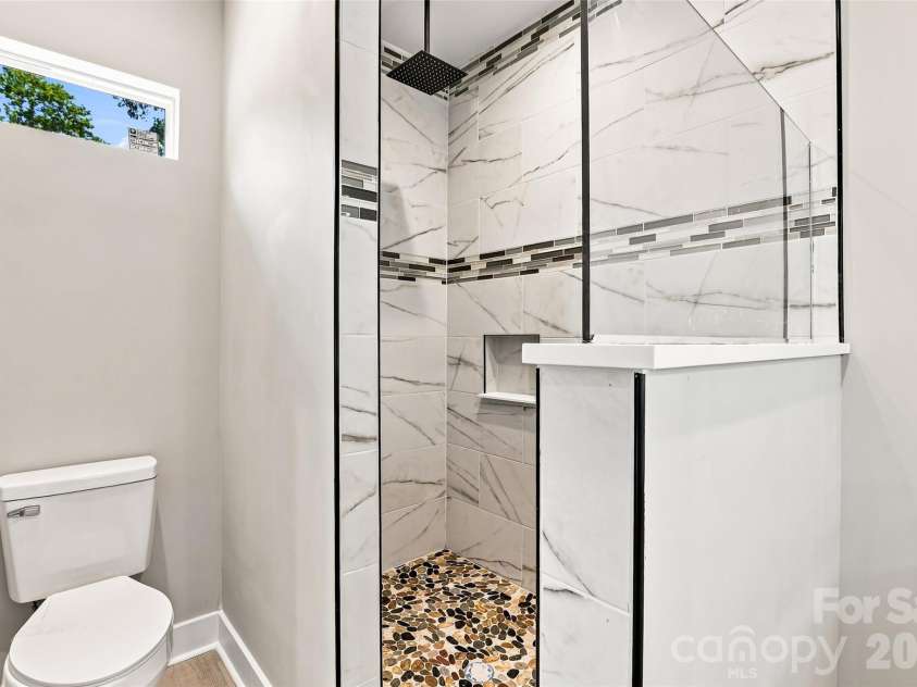 156 Edwards Avenue, Swannanoa, NC 28778.  MLS# CAR4422334, YatesRealty ID 49847. Primary Suite bathroom