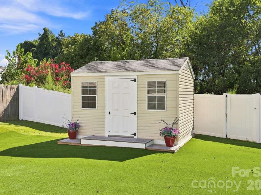 8219 Paw Valley Lane, Charlotte, NC 28214.  MLS# CAR4421685, YatesRealty ID 49848. 12' x 14' shed
