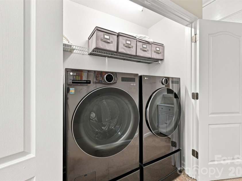 8219 Paw Valley Lane, Charlotte, NC 28214.  MLS# CAR4421685, YatesRealty ID 49848. Laundry upstairs