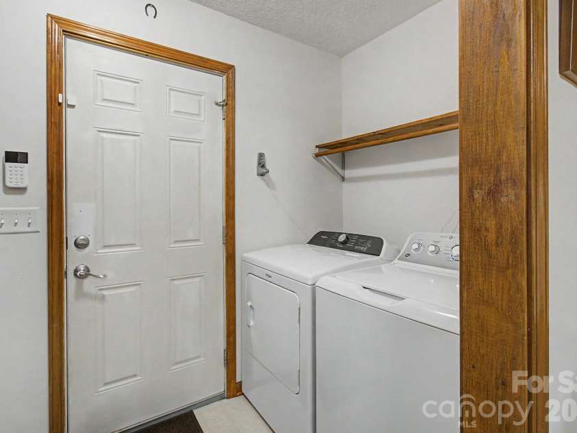 230 Blythewood Drive, Hendersonville, NC 28792.  MLS# CAR4422676, YatesRealty ID 49849. Laundry on Main in Mud Room by Garage