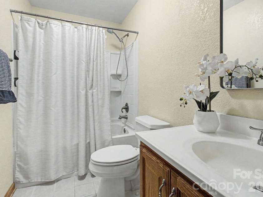 230 Blythewood Drive, Hendersonville, NC 28792.  MLS# CAR4422676, YatesRealty ID 49849. Second Full Bathroom on Main Level