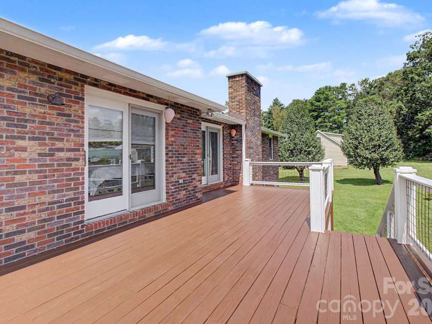 230 Blythewood Drive, Hendersonville, NC 28792.  MLS# CAR4422676, YatesRealty ID 49849. Spacious Back Deck