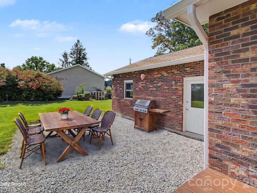 230 Blythewood Drive, Hendersonville, NC 28792.  MLS# CAR4422676, YatesRealty ID 49849. Virtually Staged