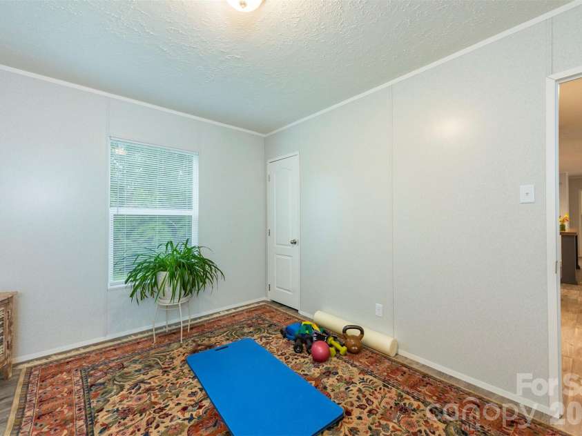 346 Tricycle Hill Lane, Tryon, NC 28782.  MLS# CAR4419540, YatesRealty ID 49859. 