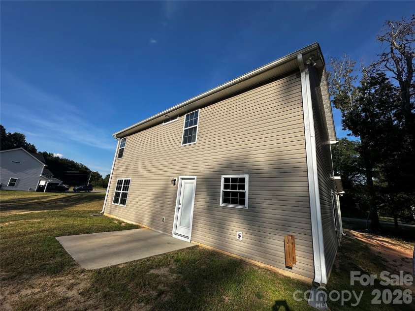 408 Elm Street, Pageland, SC 29728.  MLS# CAR4422110, YatesRealty ID 49867. Rear view/patio