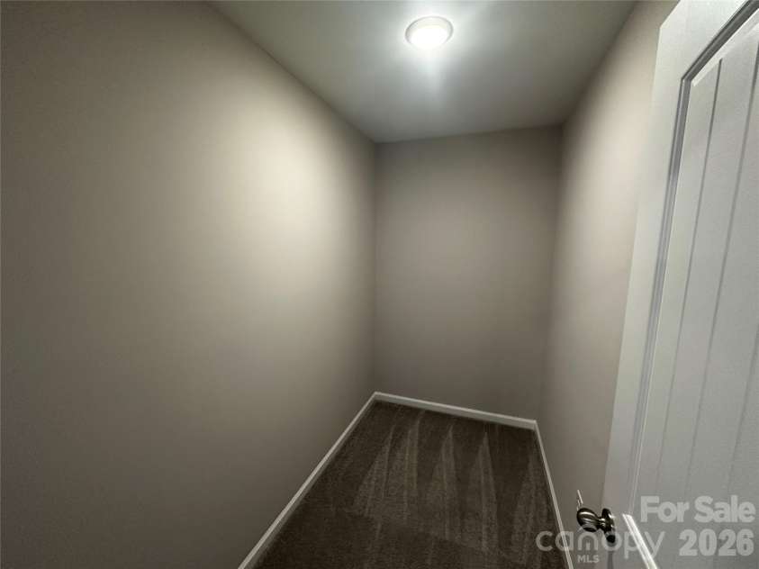 408 Elm Street, Pageland, SC 29728.  MLS# CAR4422110, YatesRealty ID 49867. Storage closet off flex space on second floor