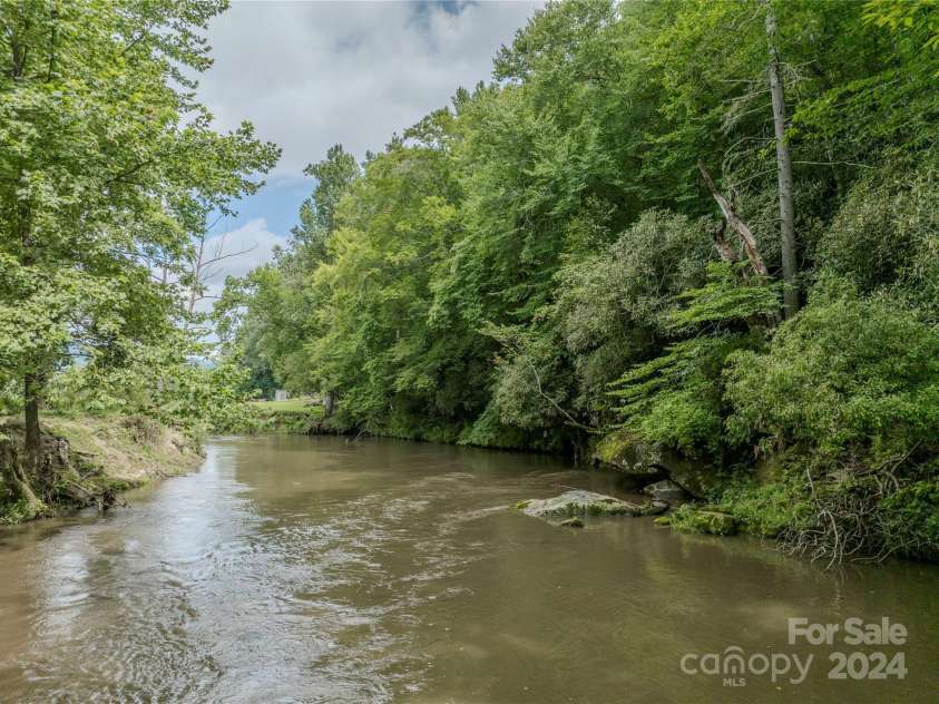 1244 Windover Drive, Brevard, NC 28712.  MLS# CAR4169991, YatesRealty ID 4987. French Broad River
