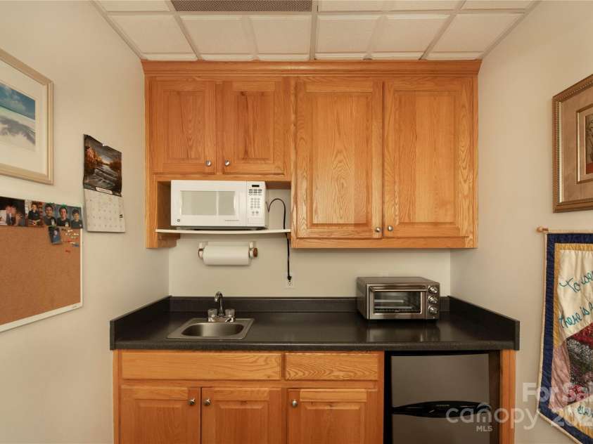 1244 Windover Drive, Brevard, NC 28712.  MLS# CAR4169991, YatesRealty ID 4987. Kitchenette in Basement