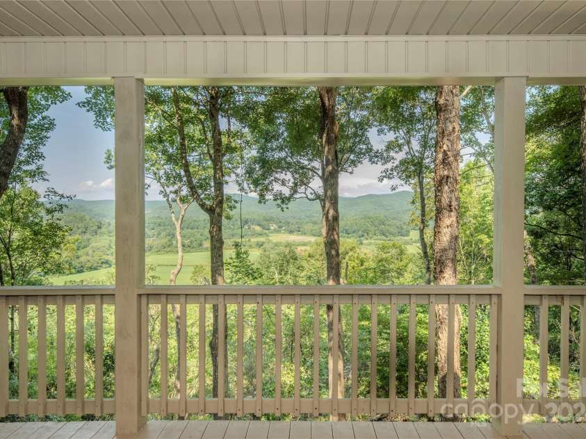 1244 Windover Drive, Brevard, NC 28712.  MLS# CAR4169991, YatesRealty ID 4987. View From Back Screened in Porch