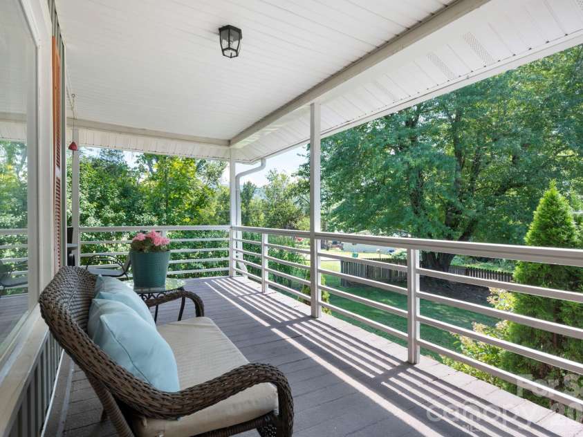 23 Maxwell Road, Asheville, NC 28805.  MLS# CAR4421518, YatesRealty ID 49871. Relaxing Front Patio