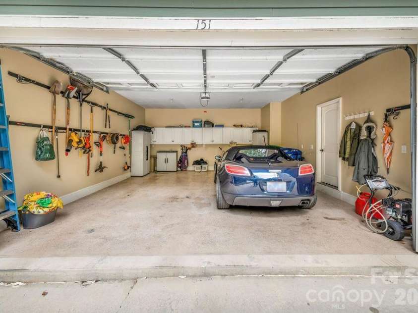 151 Hillside Drive, Swannanoa, NC 28778.  MLS# CAR4418957, YatesRealty ID 49872. 2 Car Garage w/ Shelves
