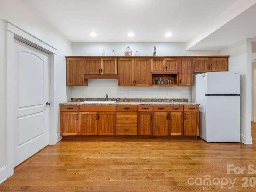 151 Hillside Drive, Swannanoa, NC 28778.  MLS# CAR4418957, YatesRealty ID 49872. Downstairs Kitchenette