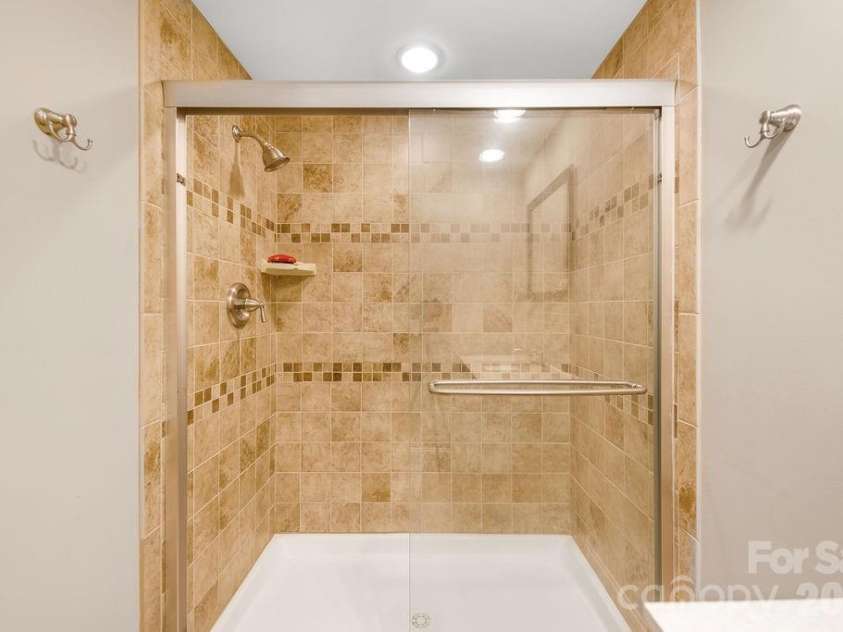 151 Hillside Drive, Swannanoa, NC 28778.  MLS# CAR4418957, YatesRealty ID 49872. Lower Level Shower