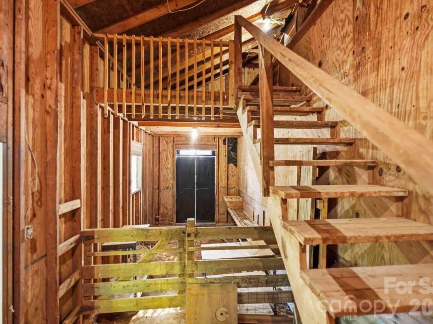 168 Country Lane, Mills River, NC 28759.  MLS# CAR4422309, YatesRealty ID 49874. Additional unfinished space within the outbuilding expands its potential for storage and other uses.