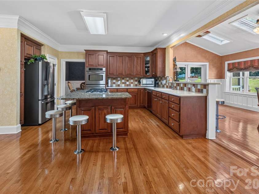6041 Bluebird Hill Lane, Matthews, NC 28104.  MLS# CAR4413086, YatesRealty ID 49886. 