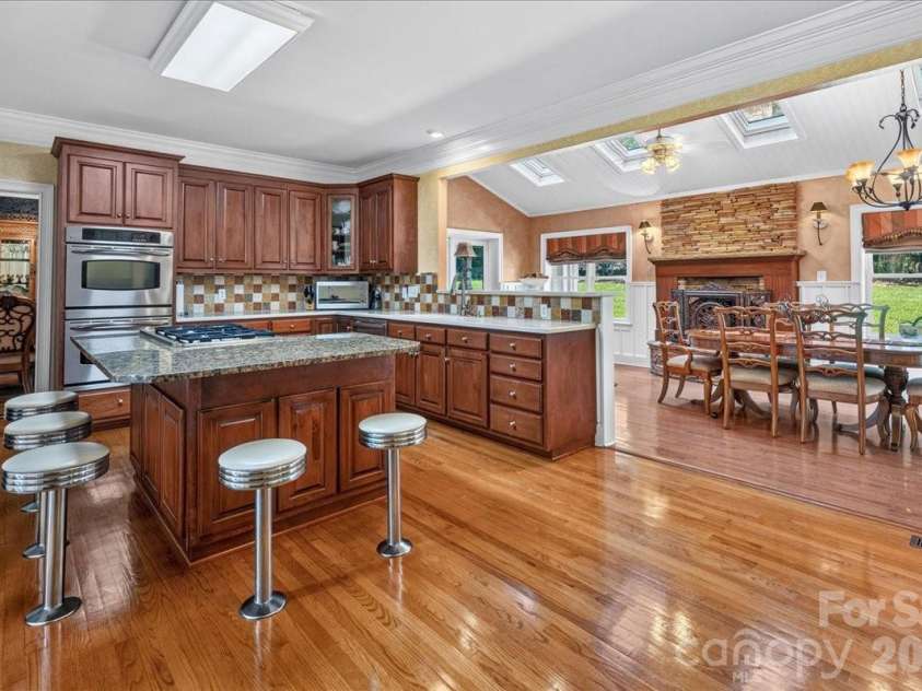 6041 Bluebird Hill Lane, Matthews, NC 28104.  MLS# CAR4413086, YatesRealty ID 49886. 