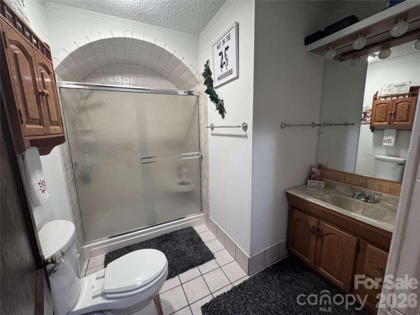 106 Myrtle Street, Morganton, NC 28655.  MLS# CAR4422677, YatesRealty ID 49887. Main bathroom