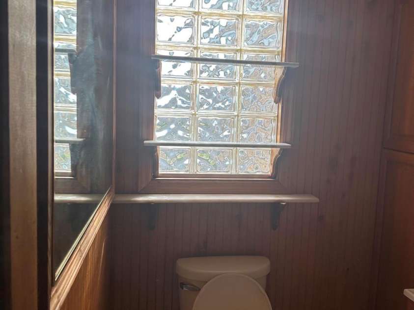 106 Myrtle Street, Morganton, NC 28655.  MLS# CAR4422677, YatesRealty ID 49887. Owner's picture - primary half-bath empty