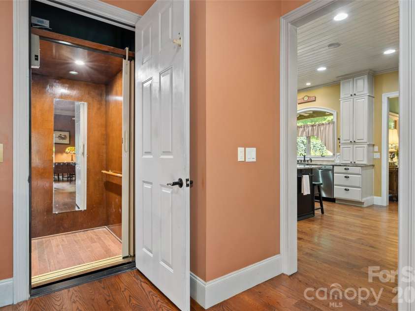 598 Old Toll Road, Asheville, NC 28804.  MLS# CAR4423120, YatesRealty ID 49890. Elevator Serving All Floors and Garage