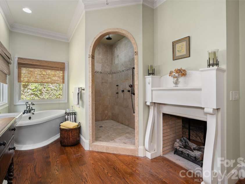 598 Old Toll Road, Asheville, NC 28804.  MLS# CAR4423120, YatesRealty ID 49890. Primary Bath with See-Through Fireplace