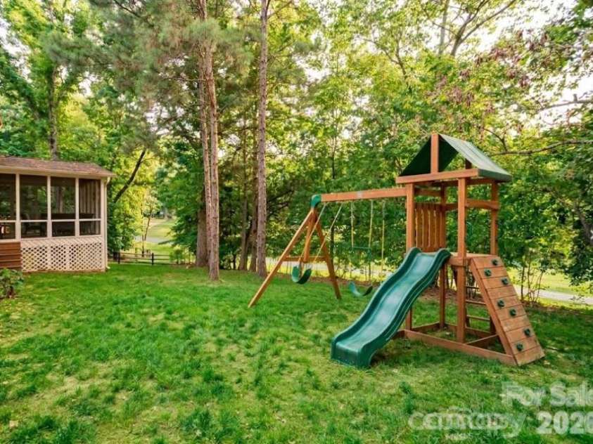 10009 Thomas Payne Circle, Charlotte, NC 28277.  MLS# CAR4421485, YatesRealty ID 49899. AI enhanced backyard