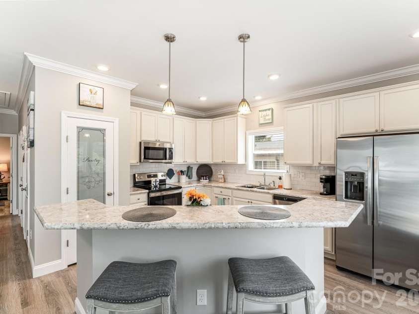 163 Cardinal Drive, New London, NC 28127.  MLS# CAR4358031, YatesRealty ID 4990. 
