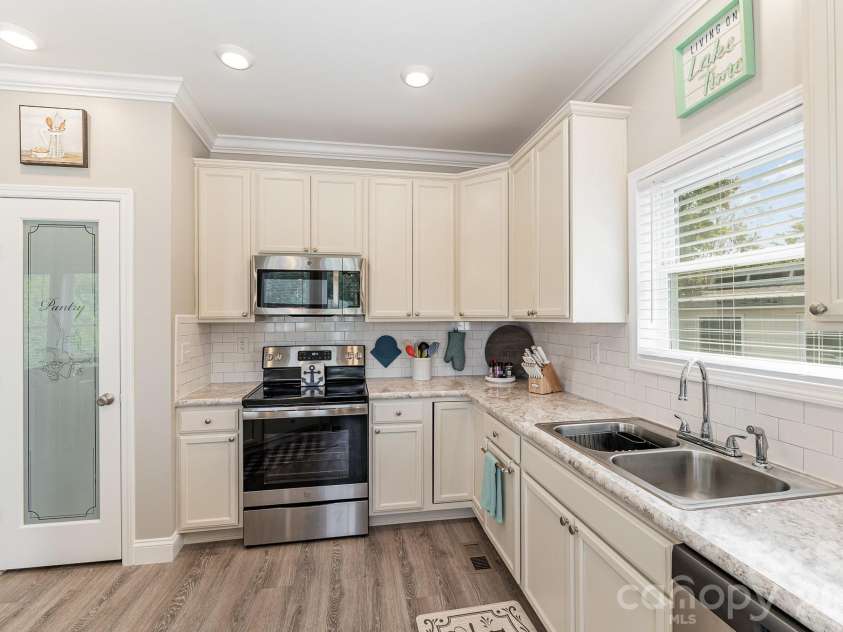 163 Cardinal Drive, New London, NC 28127.  MLS# CAR4358031, YatesRealty ID 4990. 