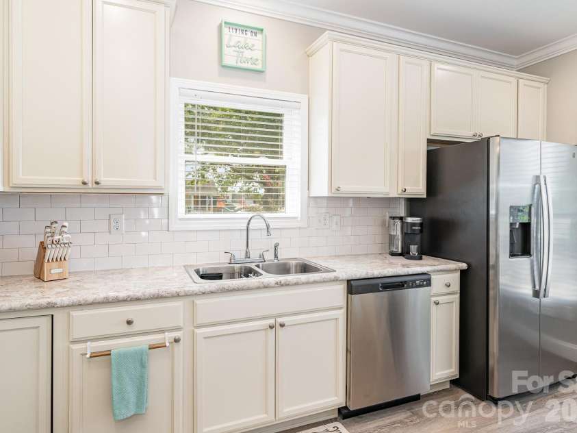 163 Cardinal Drive, New London, NC 28127.  MLS# CAR4358031, YatesRealty ID 4990. 