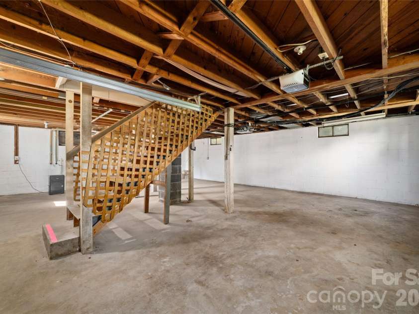 13 Browndale Road, Asheville, NC 28805.  MLS# CAR4382752, YatesRealty ID 49900. Basement with 1 car garage
