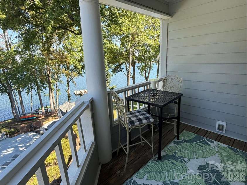 327 Northwest Drive, Davidson, NC 28036.  MLS# CAR4423032, YatesRealty ID 49906. Balcony has room for a table and several chairs