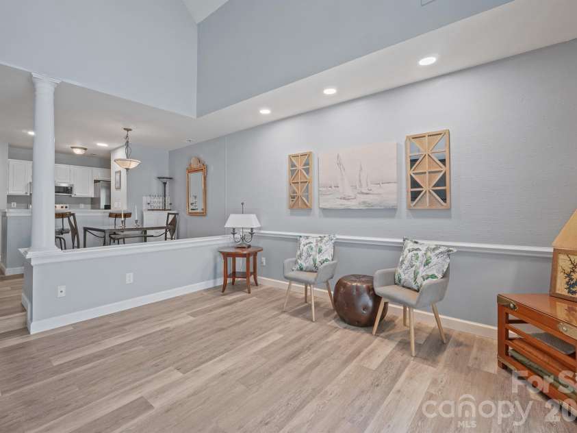 327 Northwest Drive, Davidson, NC 28036.  MLS# CAR4423032, YatesRealty ID 49906. Half wall makes a nice separation for Dining area