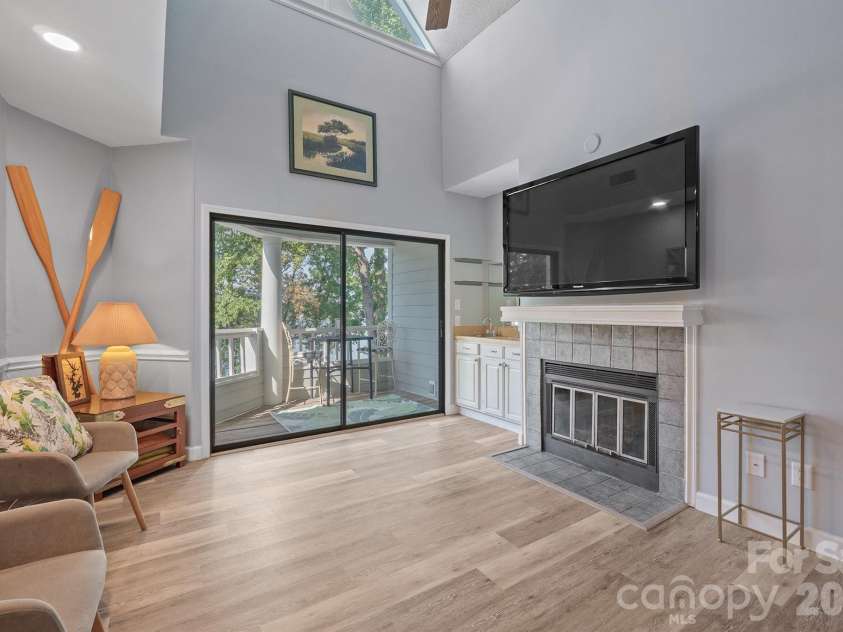 327 Northwest Drive, Davidson, NC 28036.  MLS# CAR4423032, YatesRealty ID 49906. Seller added extra lighting in the soffit on the left for more brightness