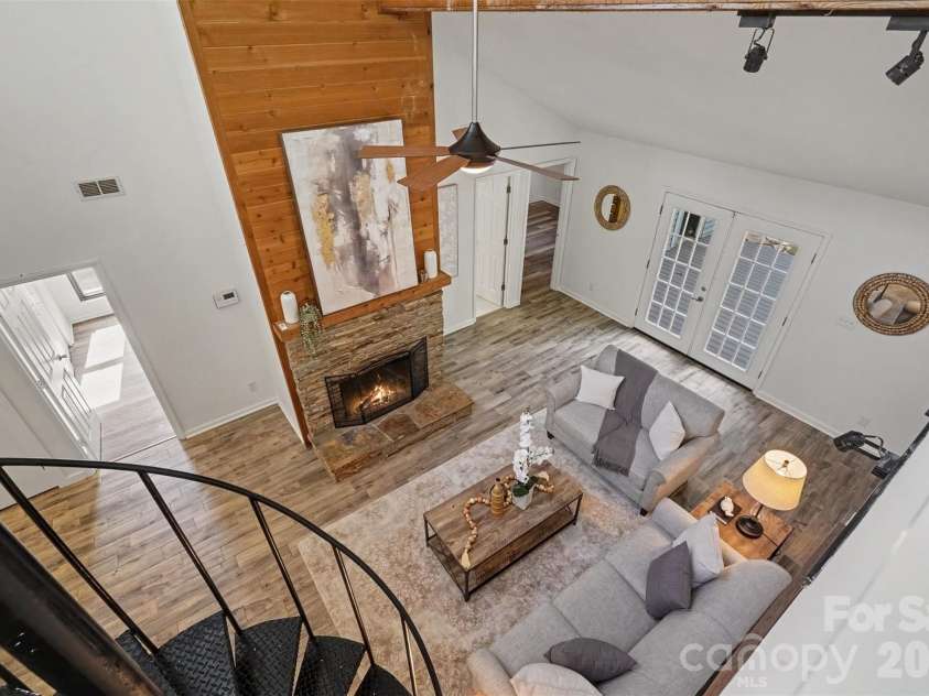 9620 Fir Knoll Road, Mint Hill, NC 28227.  MLS# CAR4419906, YatesRealty ID 49919. Great room viewed from loft
